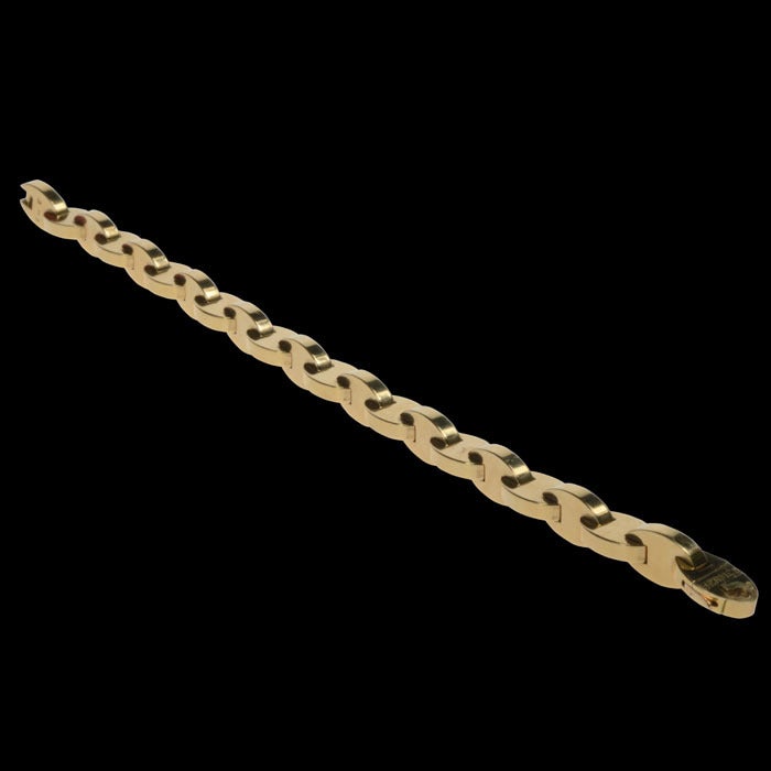 PLEASE NOTE: OUR PRICE IS FULLY INCLUSIVE OF SHIPPING, IMPORTATION TAXES & DUTIES

Fine 18ct yellow gold bracelet designed as a row of oval-shaped links, Hermes, Paris, c1970
