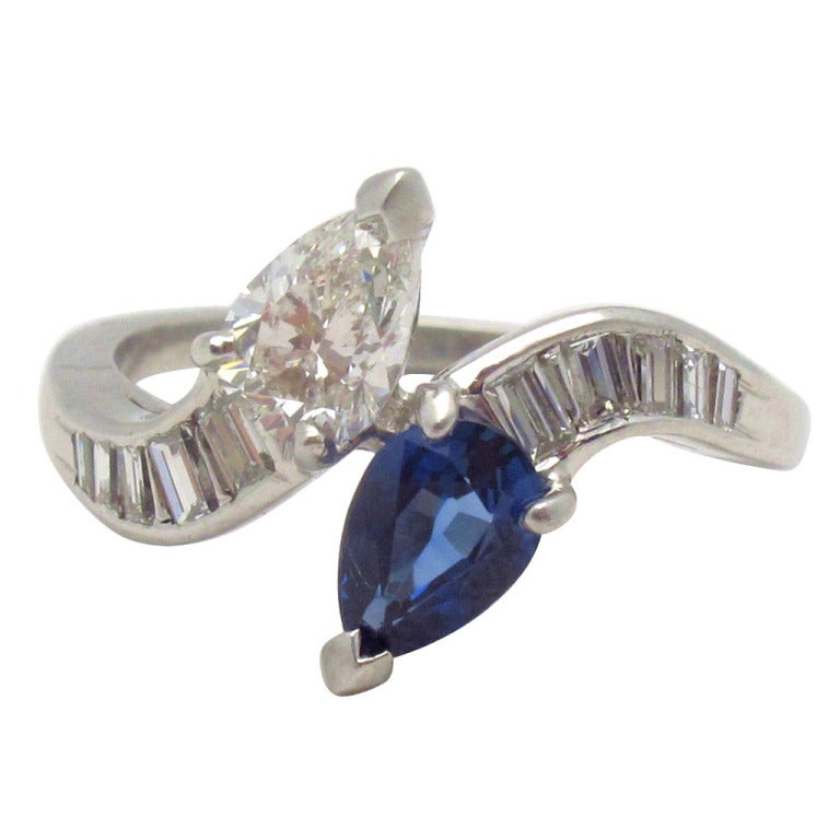 Diamond Sapphire Platinum Crossover Ring For Sale