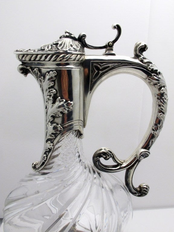 French Caret Jug mounted with 950 silver and swirled cut crystal, adorned with oak leaves and berry accents.