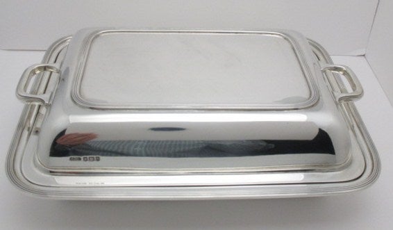 Tiffany & Company sterling silver entrée dish marked Sheffield c.1956.
Stamped T & Co. on top and base.