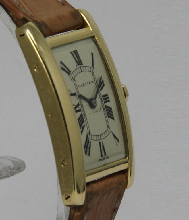 Cartier
Tank Americaine
First Edition

Case
18k yellow gold, acrylic glass

Movement
manual-wind, date

Bracelet
kroko-leather strap, buckle

original condition
circa 1955