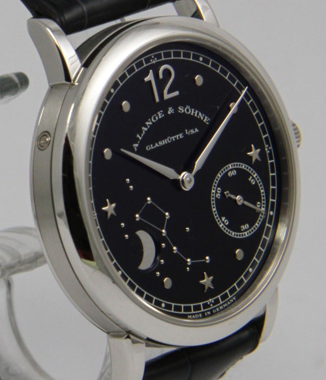 A. Lange & Sohne
1815
Ref. 231.035
Hommage Emil Lange 1859-1922

Case
platinum, sapphire crystal, sapphire crystal case back secured by screws, 36mm

Movement
caliber L941,1, manual-wind, power reserve, moonphases

Bracelet
kroko leather