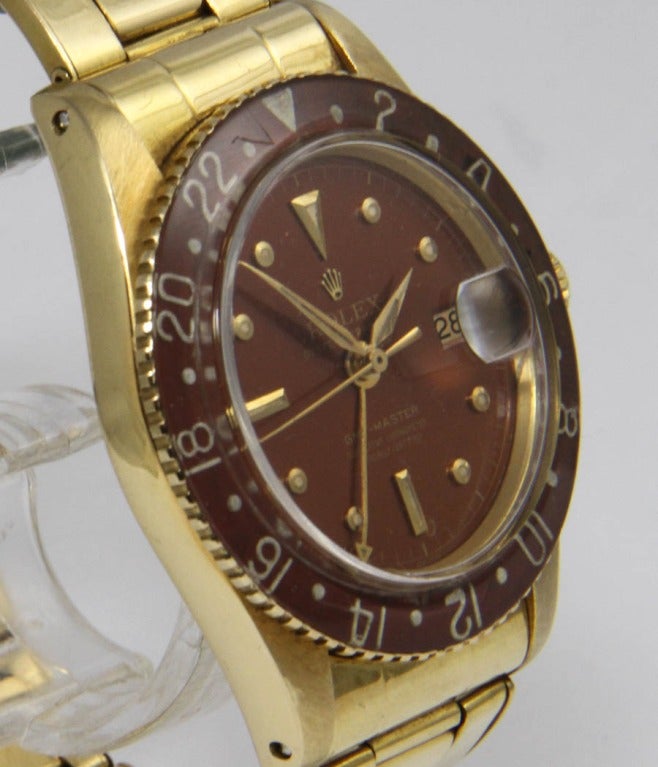 Rolex
18k Yellow Gold GMT-Master
Ref. 6542

Case
18k yellow gold, screwed back, acrylic glass, very rare rotating original bakelite bezel, screw-down crown

Movement
caliber 1030, automatic, butterfly rotor, chronometer-rated,
