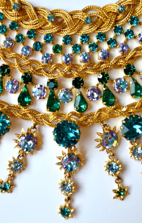 Spectacular 1960s Countess Zoltowska braided goldmesh multistrand necklace, of intricate settings of turquoise green, light blue and iridescent Swarovsky crystals, alternating with 3  rows of wide braided gilt strands, all enhanced by 15 pendant