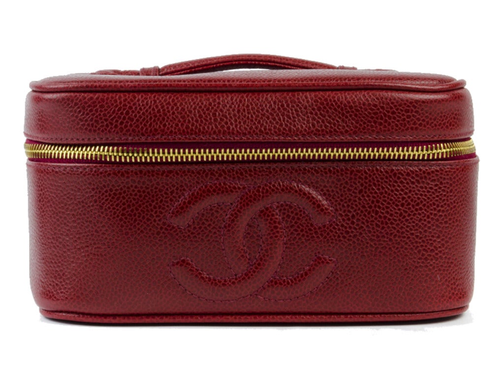 Your make-up or other toiletries would be oh so happy if you put them in this fun and chic Chanel vanity. It has red leather and a gold zipper to add a little flavor. 4
