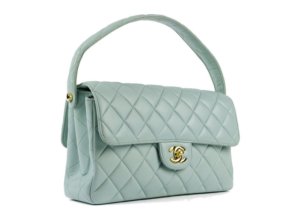 Pair this light seafoam quilted leather beauty with jeans, a crisp white blouse and plenty of gold baubles for a polished and confident meets simple and feminine daytime look. Bag measures 10