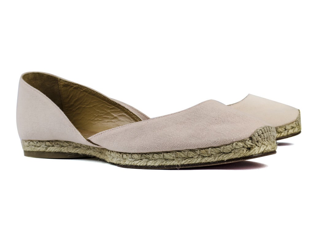Perfect for spring! Christian Louboutin 'Bailarina' pink canvas espadrille flats are done in a classic d'orsay style, pink canvas throughout with a round toe and espadrille sole. New In Box. Size 40.