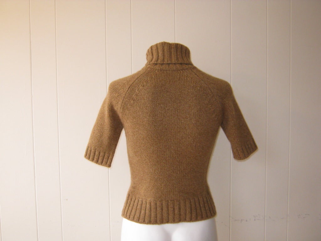 Beautiful weighty cashmere turtle neck sweater, with heavy ribbing on collar, cuffs and hem.

The quality and finishes of this sweater are very noticeable. Although a French brand Celine has most of their clothing made in Italy.