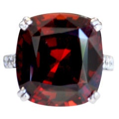 Spessertite Garnet and Diamond Ring
