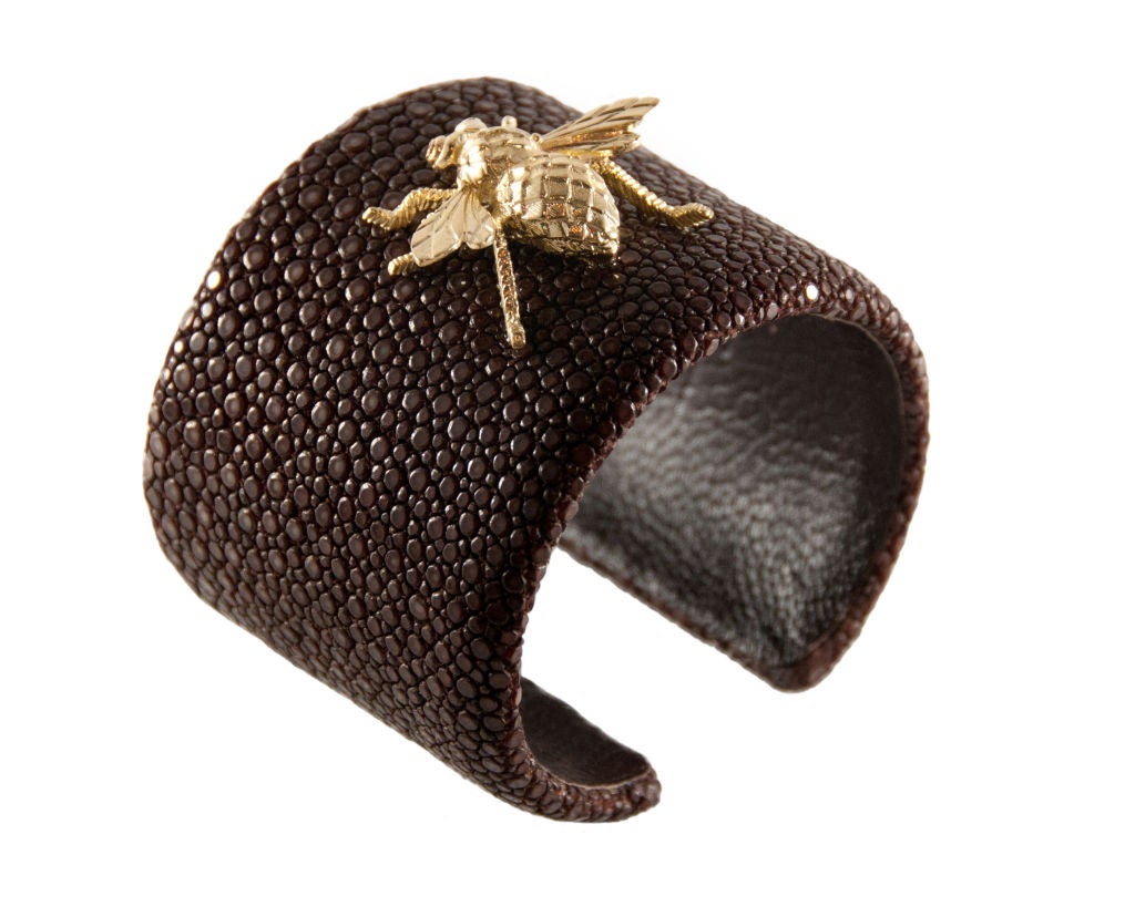 Chocolate Shagreen Cuff Monted with a Vintage 18k Yellow Gold<br />
Napolionic Bee with Ruby Eyes <br />
Cuff 2