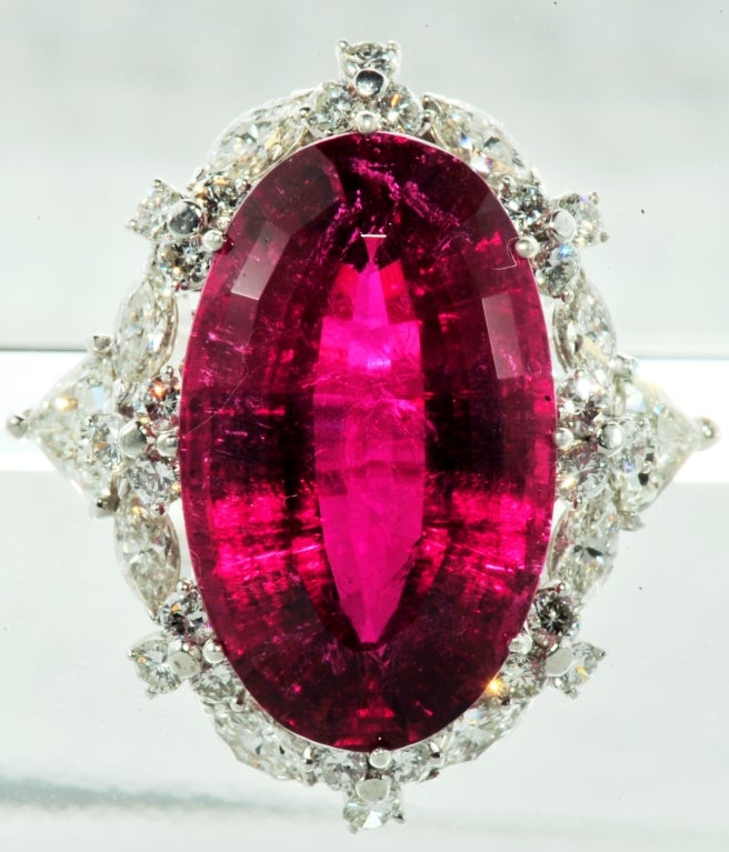 Platinum, Rubelite-Tourmaline and Diamond Ring 
Rubelite weighs approx 28.00 carats 
Diamonds approx 4.00 carats