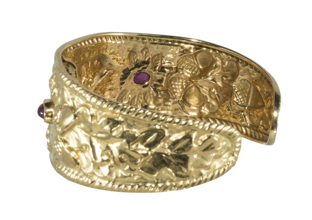 Hand Reposse  La. Nouvelle Bague Gold and Ruby Cuff
with 2 Ruby Cabochon