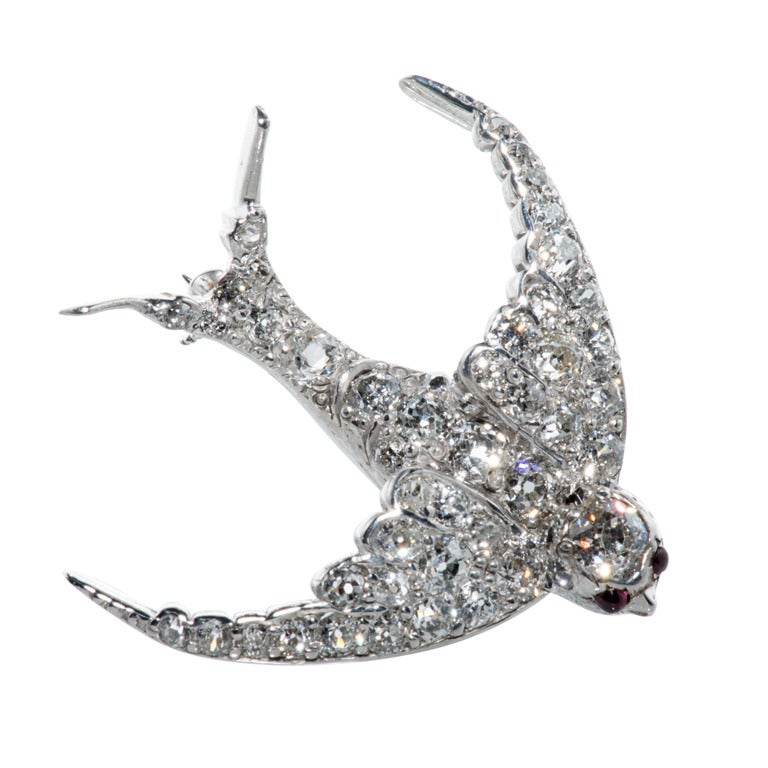  Diamond Swallow Brooch with Ruby eyes. For Sale