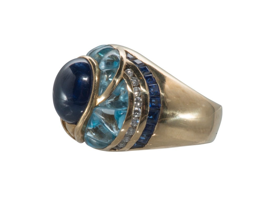 Contemporary Wink Aquamarine Sapphire Diamond Ring