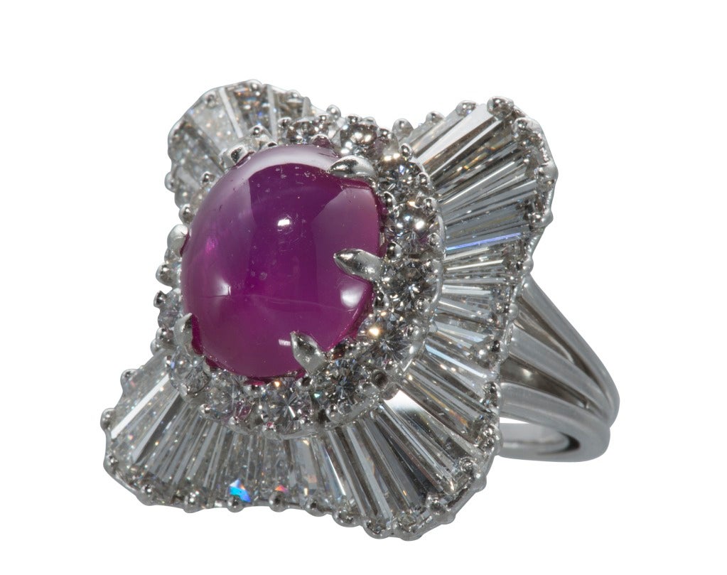 Stunning platinum Star Ruby and Baguette-Cut Diamond Cocktail Ring.
Center stone approximately 8 ct.