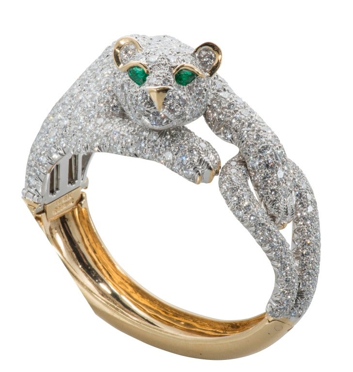 Spectacular 18k, Platinum and Diamond Pave Panther Bracelet  with Emerald Eyes. Accompanied by original bill of sale and appraisals from David Webb, Houston.