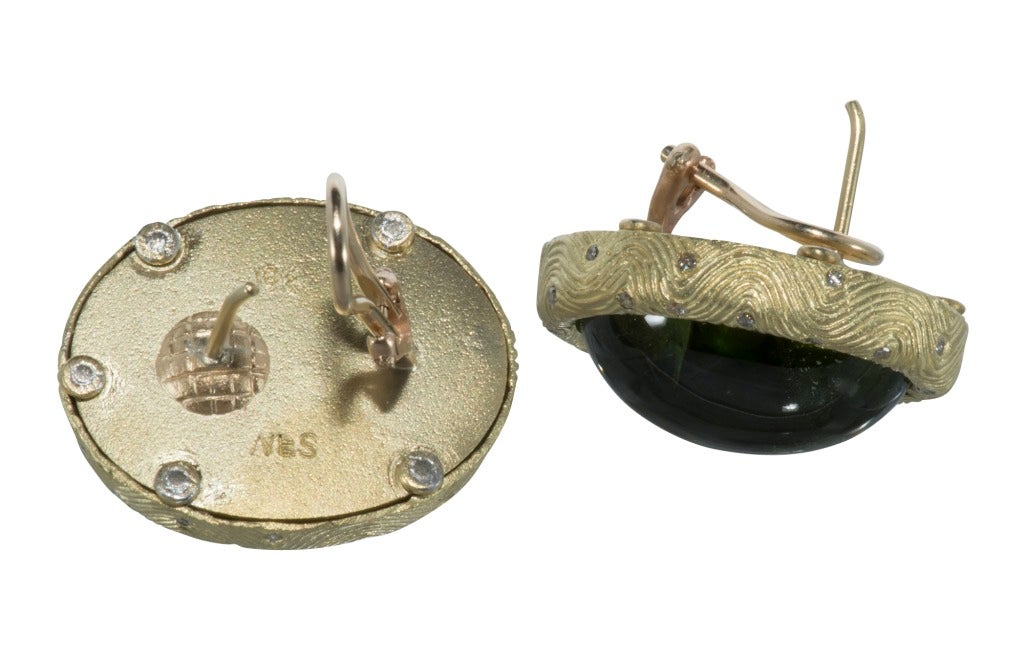 Unusual 18k Cabochon Peridot and Diamond Earrings. 
Signed WFS.