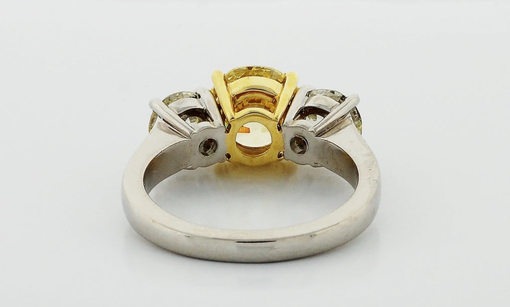 The color on this natural yellow is just about perfect with a hint of green, true Canary yellow. All three of these old European cut diamonds have sparkly and brilliance that matches or exceeds modern Ideal in my opinion. They are at or just over