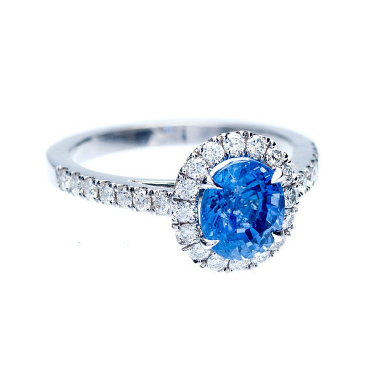 European Cut Oval Sapphire Diamond Halo Ring