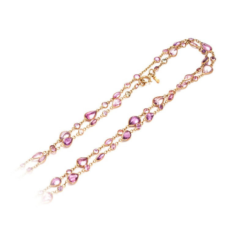 Wonderful 38 inch long chain in all natural color Sapphires from bright pink to purplish pink to light pink to soft yellow. Total 33.34cts. Can be worn long or double and adjusted top to bottom to different lengths. GIA certified as simple heat