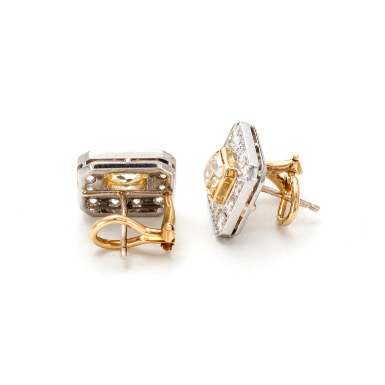 Peter Suchy handmade 14k white and yellow gold octagon earrings earrings with two yellow diamonds surrounded with a white diamond halo. Clip post

2 radiant cut diamonds 1.09ct and 1.08ct, approx. total weight 
2.17cts, natural untreated fancy