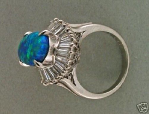 Black Oval Opal And Baguette Diamond Platinum Ring 1950-1960 In Excellent Condition In Stamford, CT