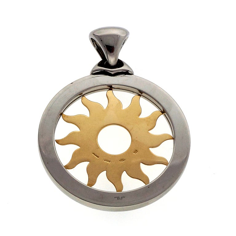 Large Size Tondo (Sun) pendant by Bvlgari in 18k yellow gold and steel. Good condition. 

Stamped: 750 Made In Italy 
Hallmark: Bvlgari 
Tested: 18k & Steel 
Width: 43.48mm or 1.71 inches 
Width: 3.67mm