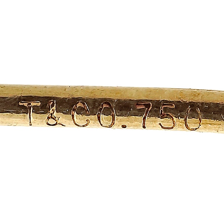 Tiffany & Co. Ohrringe aus Gelbgold mit Knoten und Drehung Damen