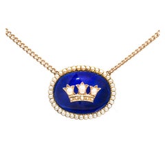 Collier pendentif en or, émail bleu cobalt et perle naturelle