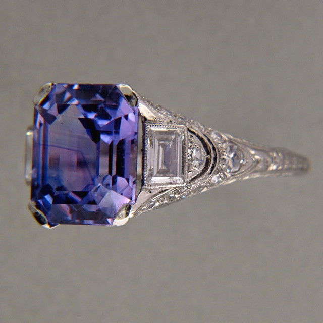 All original 1920's Art Deco Platinum ring with colorless near flawless diamonds.  Tiffany + Co Art Deco ring. The stamp is warn. Stone sent to the GIA for certification # 2135391802. Certified as natural no heat color change violet to violet blue.