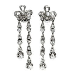 Diamond Platinum Bow Dangle Earrings