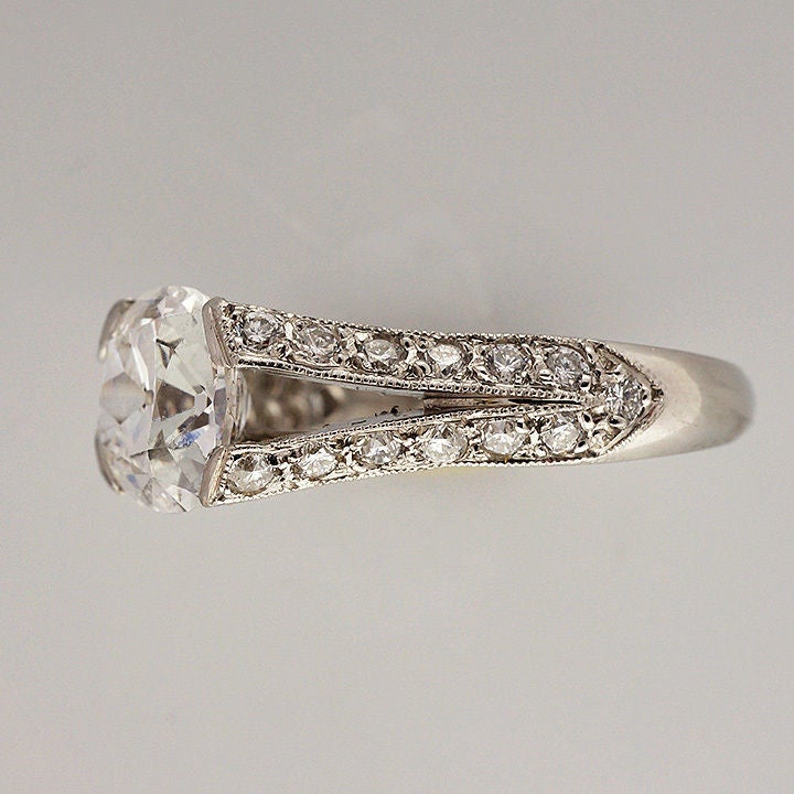 1930’s antique cushion cut diamonds I have ever seen.  Truly Ideal cut 59.7% depth and 57% table, 1.83cts, D, VS1 and GIA certified.  The setting is designed by Peter Suchy himself to show off this diamond.Made in our workshop. Set across the finger