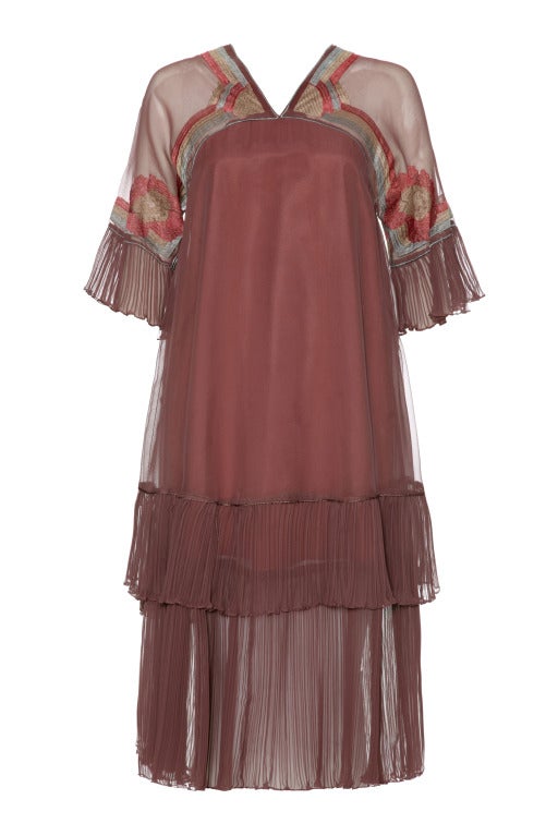 A gorgeous maroon chiffon loose fitting midi dress from 70’s British designer Janice Wainwright.  This dress pre dates 1974, as it has her earlier 