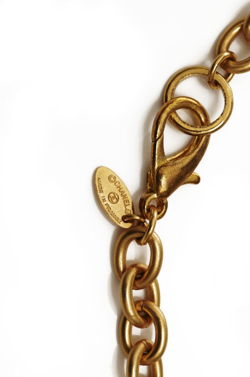 1980s Chanel Gold Charm Necklace at 1stdibs