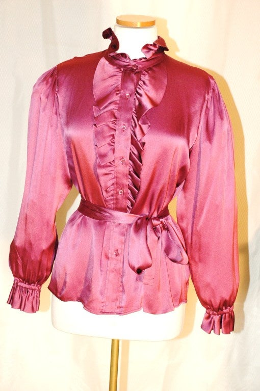 This is a gorgeous vintage Yves Saint Laurent Rive Gauche 100% silk blouse with scarf. Made in France.  Size 38
Measurements:
Bust 40