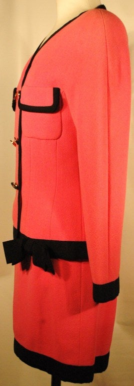 Chanel 1980s Pink ICONIC Jacket Skirt Suit w Bow Trim CC Logo Buttons In Excellent Condition For Sale In Lake Park, FL