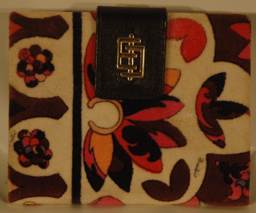 This is a vintage 1960s Emilio Pucci velour exterior wallet with leather interior lining  kiss lock coin holder compartment.  Made in Italy.  Never used.  Measures 4 3/4