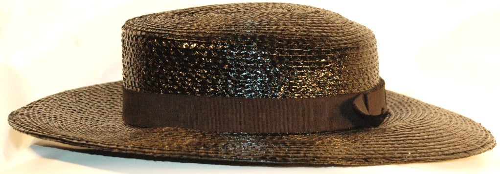This is a vintage Yves Saint Laurent Rive Gauche black hat.
Made In France.  Style/model A651
Measures: 14