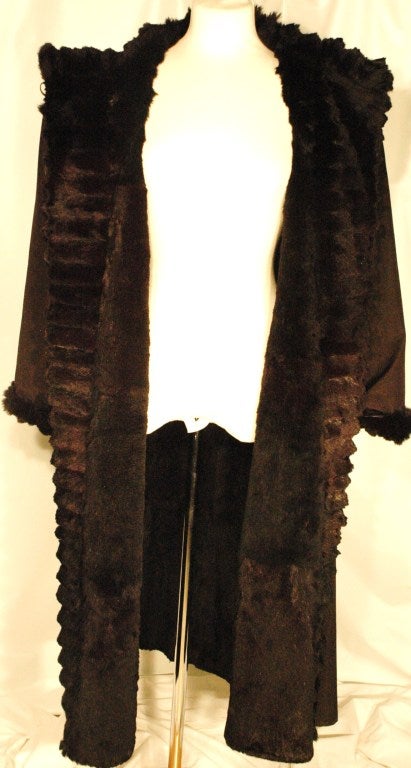 This is a vintage Yves Saint Laurent Rive Gauche sheared rabbit fur lined black trech coat.
Made in France
Length 50