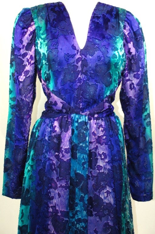 This is a Pauline Trigere for Saks Fifth Avenue multi color long sleeve silk chiffon lined dress with V neck and back zipper 
Measurements:
sleeves 26