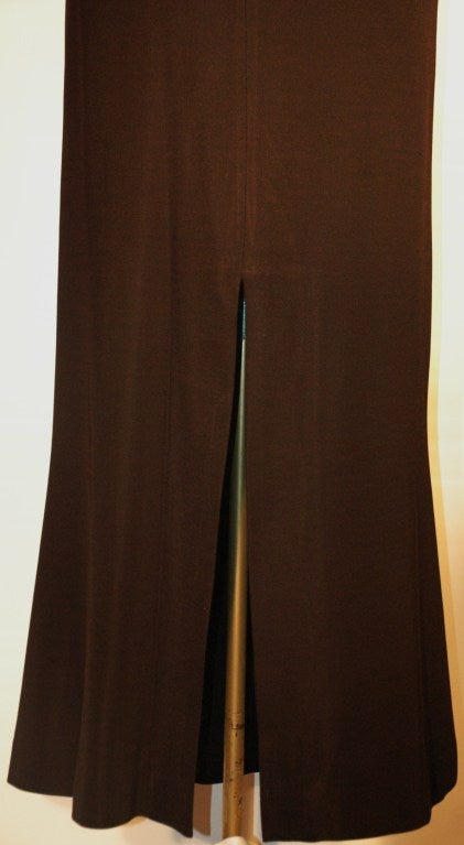 Vintage Yves Saint Laurent Rive Gauche black long ball skirt size 42.
Model/style RG E86 S4 148
60% acetate, 20% nylon, 20% silk
Fully lined with 55% acetate and 45% rayon.  Made in France
Waist 30
