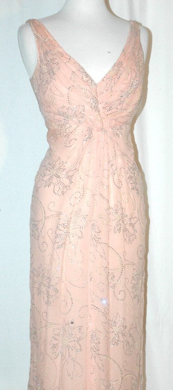 This is a sweet Arnold Scaasi blush gown with crystals and pearls beaded design. Back zipper, bust 34, 54
