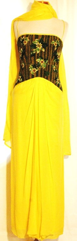 This is gorgeous Frank Tignino nearly endangered gown.  Yellow silk chiffon multi layer strapless  or spagetti strap with ebroidered and beaded hidden corset top.  Separate shawl. 
Measurements:
Bust 34-36
Torso ebroidered 13