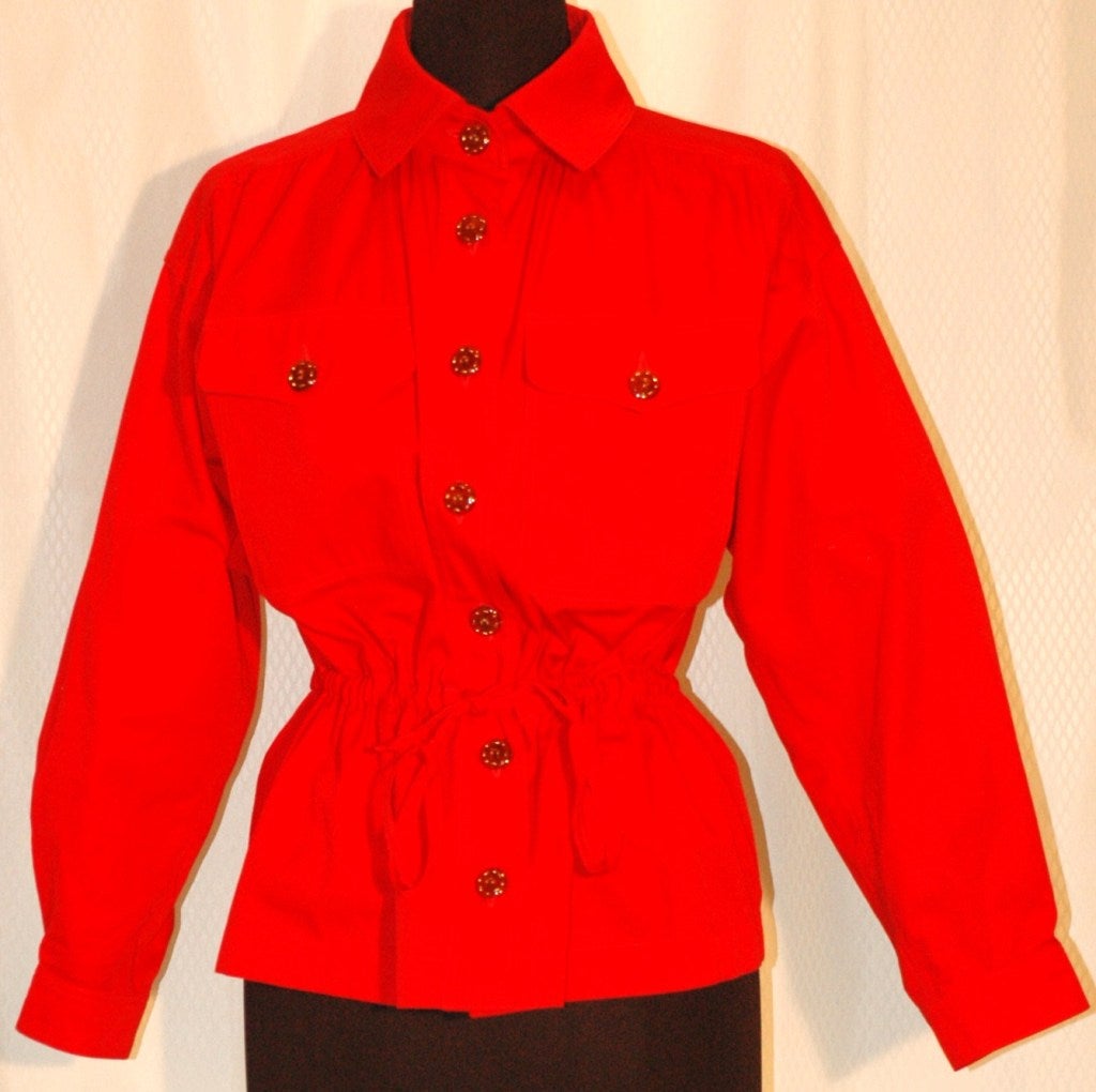 VIntage Yves Saint Laurent Rive Gauche red cotton button up long sleeve Safari style pocket shirt with drawstring cinch waist.  Size 44
Bust up to 36