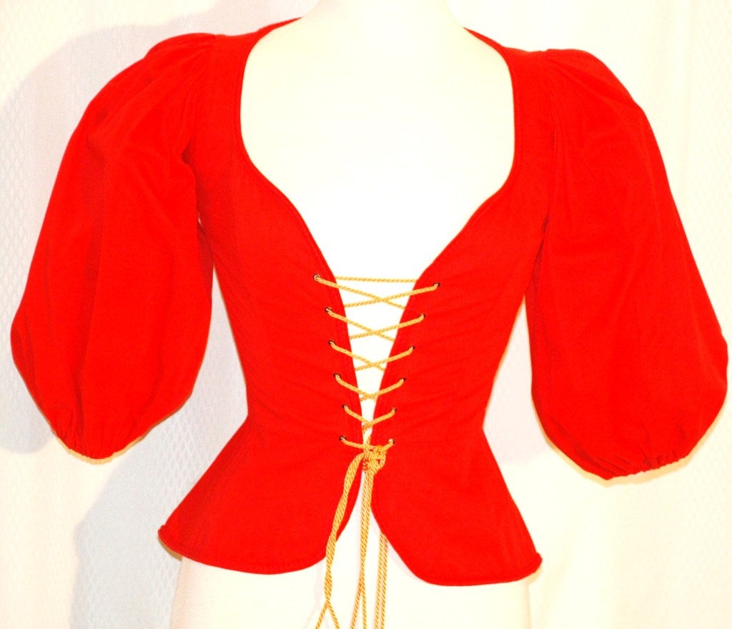 This is a vintage Yves Saint Laurent RIve Gauche red corset style gold tassle silk cord. SIze 40.  Made in France. 21