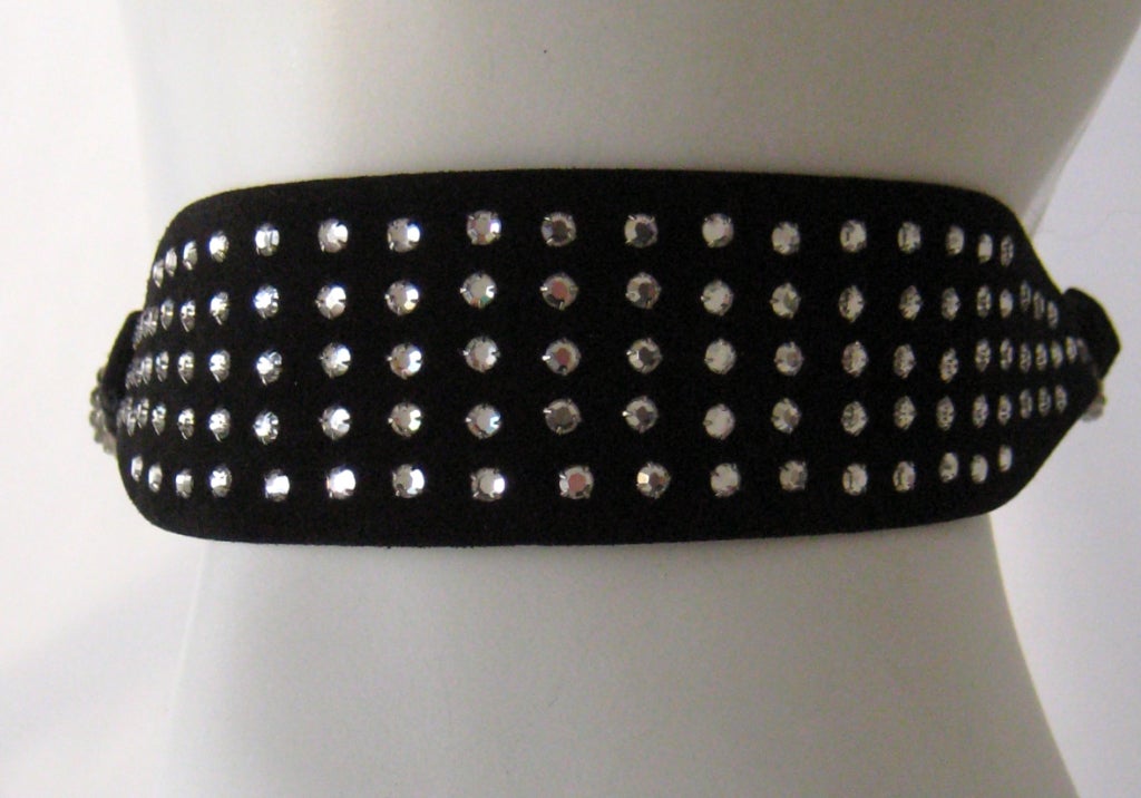 gorgeous ysl belt that dates to the 1960s
black suede studded with rhinestones
waist mesures 28-30″ and belt is 2″ wide