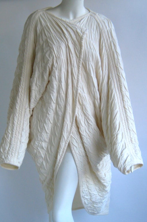 Thick quilted cotton knit
Lined in soft cotton knit
No closures
Dolman sleeves 
Pleated back drape