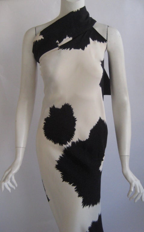 Fine lustrous silk 
True wrap  has corset closure at the neckline in back
Unworn with original store tags