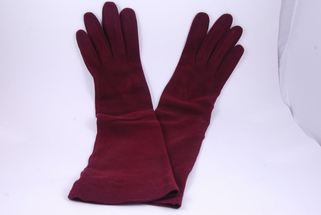 Vintage Hermes, Paris 3/4 length kidskin gloves. These gloves are probably from the 1960's. There is a double row of what appears to be hand stitching and the edge of the glove. The size on the inside of the glove says 7 1/2 but I think this is a