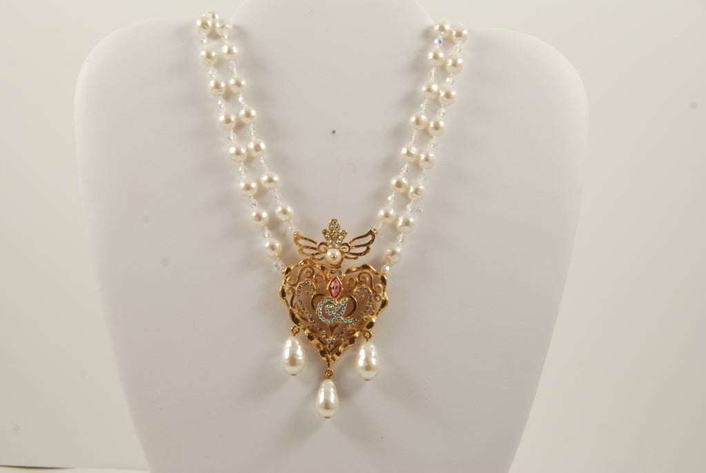 Christian Lacroix pearl, crystal bead, rhinestone and gold plaque necklace. Length of the necklace is adjustable from 16